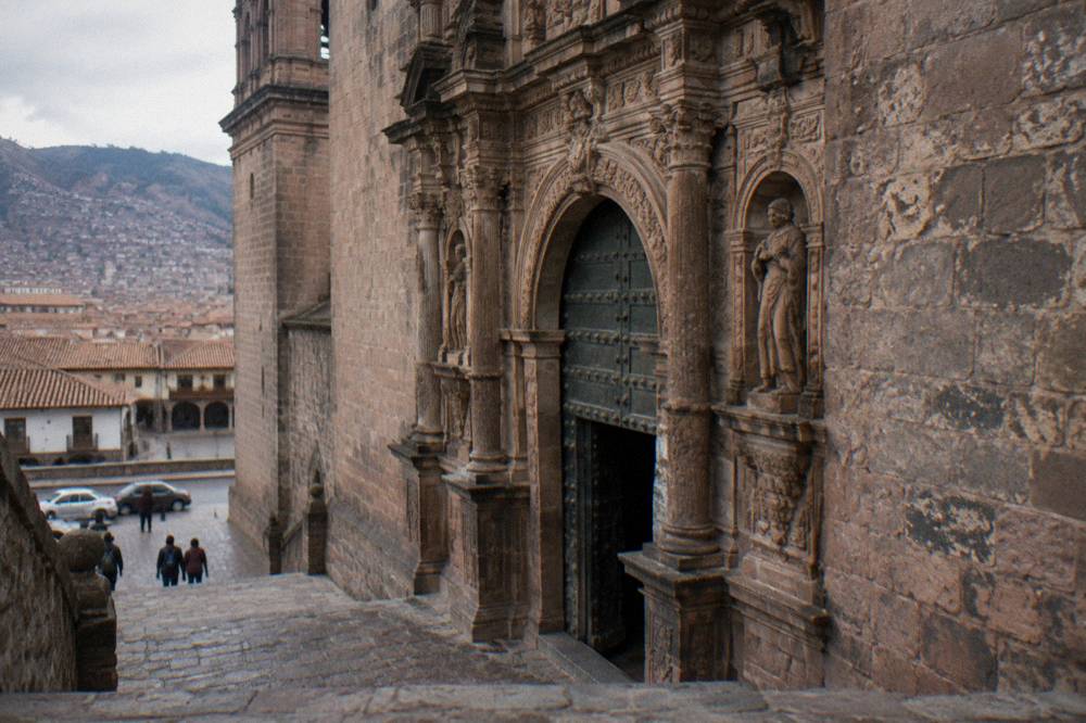 Detail of the Cathedral's carved stone doorway and weathered facade blocks