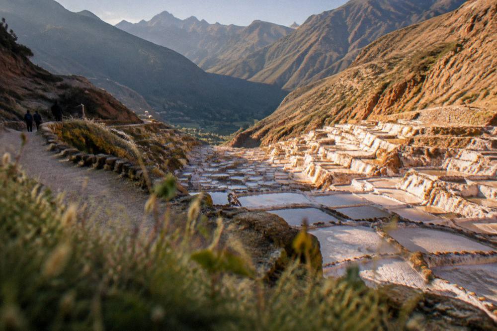 Late afternoon sun warming the walls of the salt terraces above the Sacred Valley