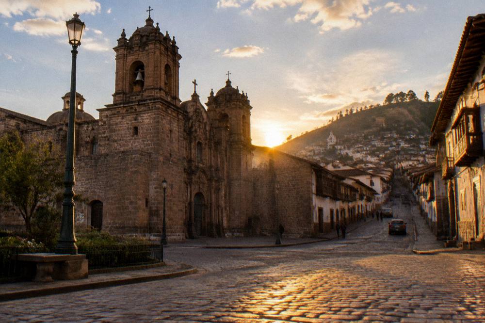 Narrow cobblestone streets climbing from the square towards the San Blas neighbourhood