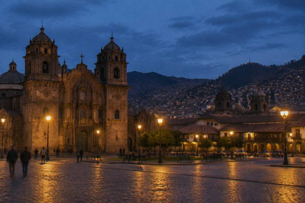 Evening light on the plaza with the hills and church domes behind the rooftops