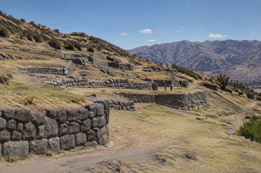 Terraced Inca stone walls on the dry hillside at Tambomachay near Cusco