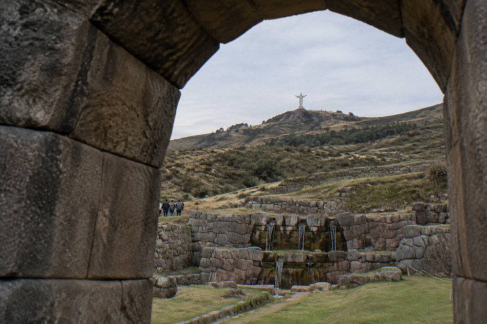 The white Cristo Blanco statue on the hills above Cusco under a clear sky