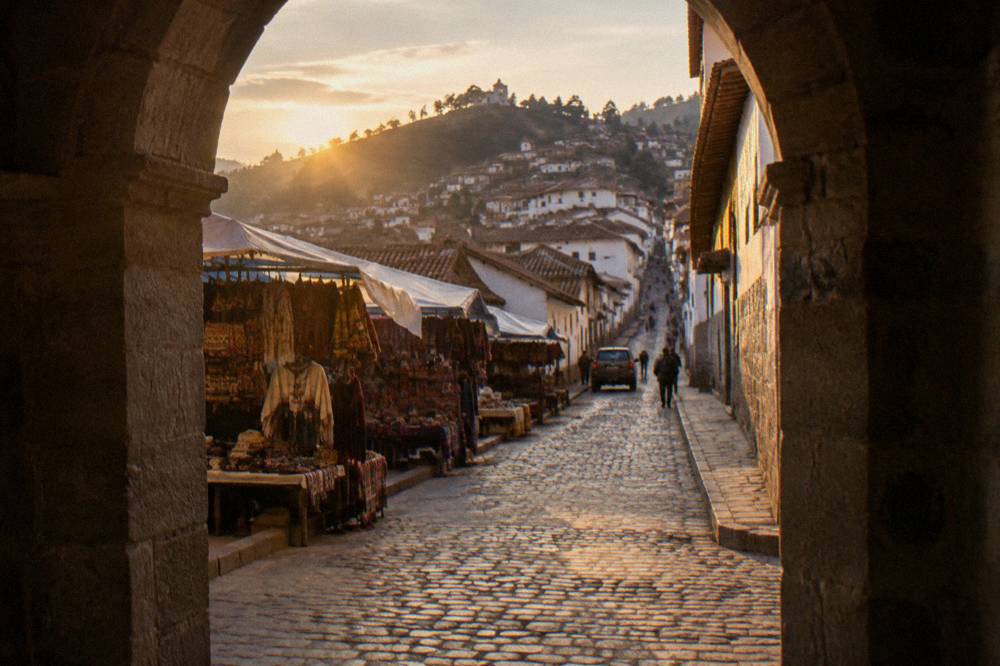 A quiet cobbled street in the historic centre of Cusco climbing towards the San Blas hillside