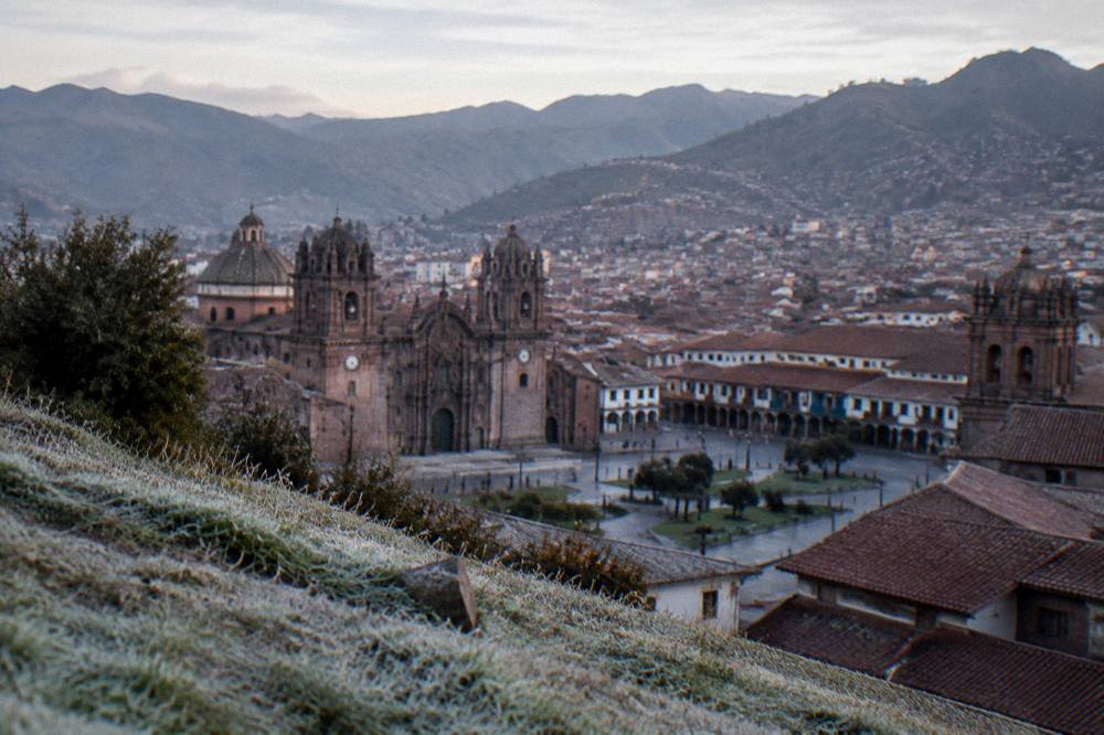 Frost covered grass on a high hillside above Cusco under early morning light