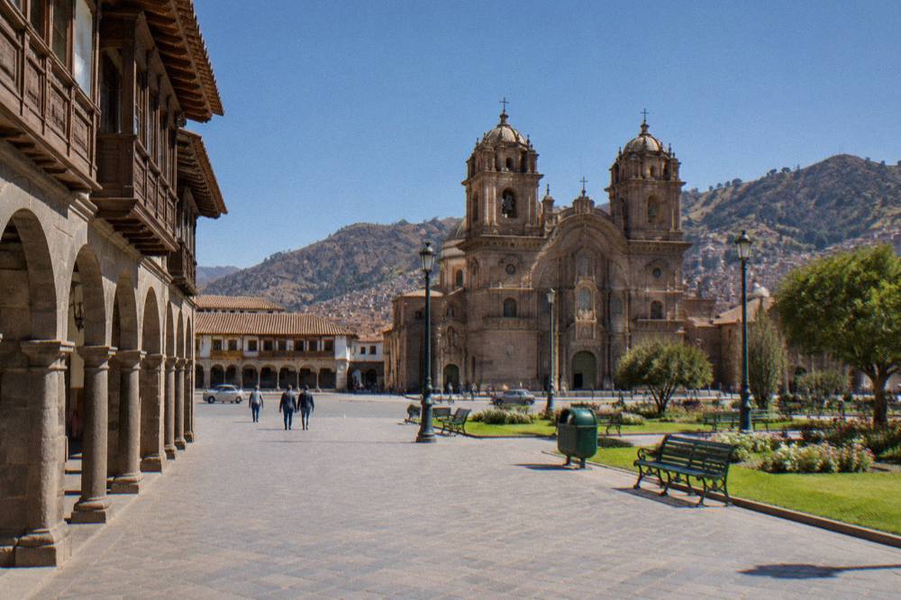 The Plaza de Armas of Cusco with its cathedral and stone arcades under a clear sky