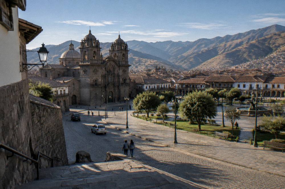 The dry season hills and deep valleys of the Cusco region under a wide sky