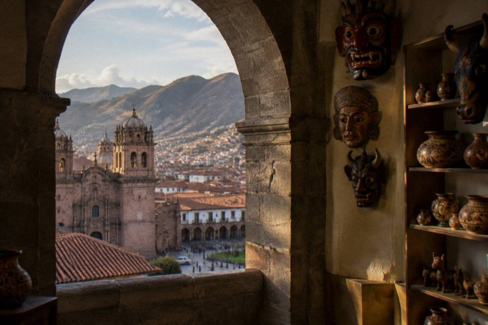 Folk art masks and ceramics on shelves in a small Cusco museum