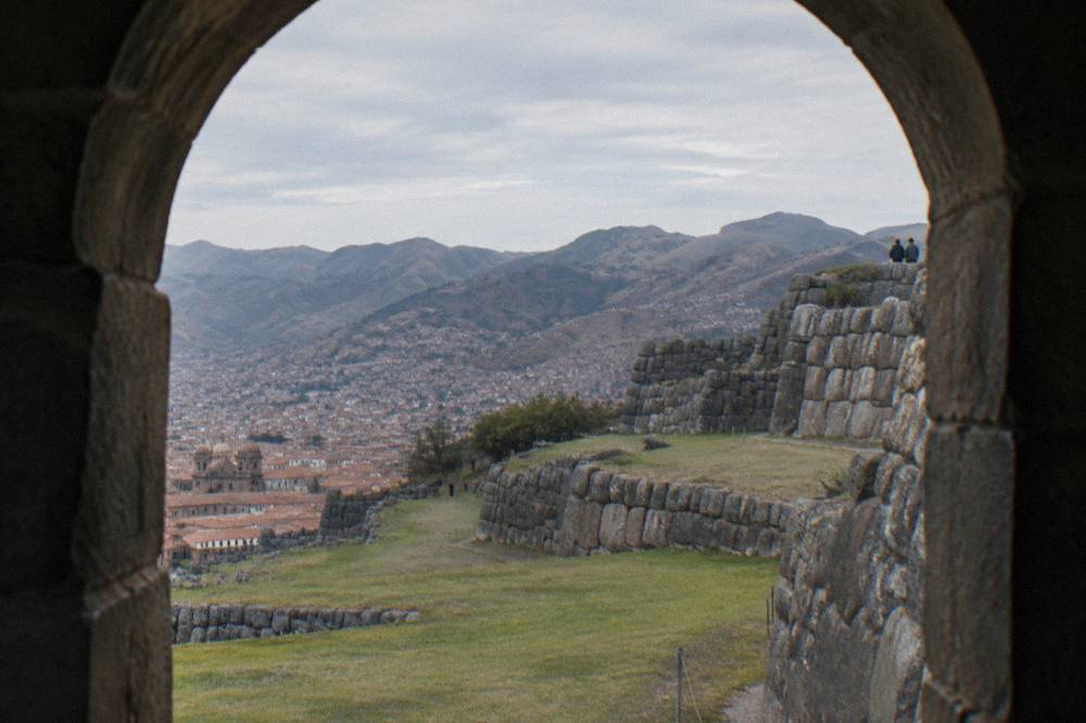 Terraced stone walls of Sacsayhuaman above Cusco with the city spread below