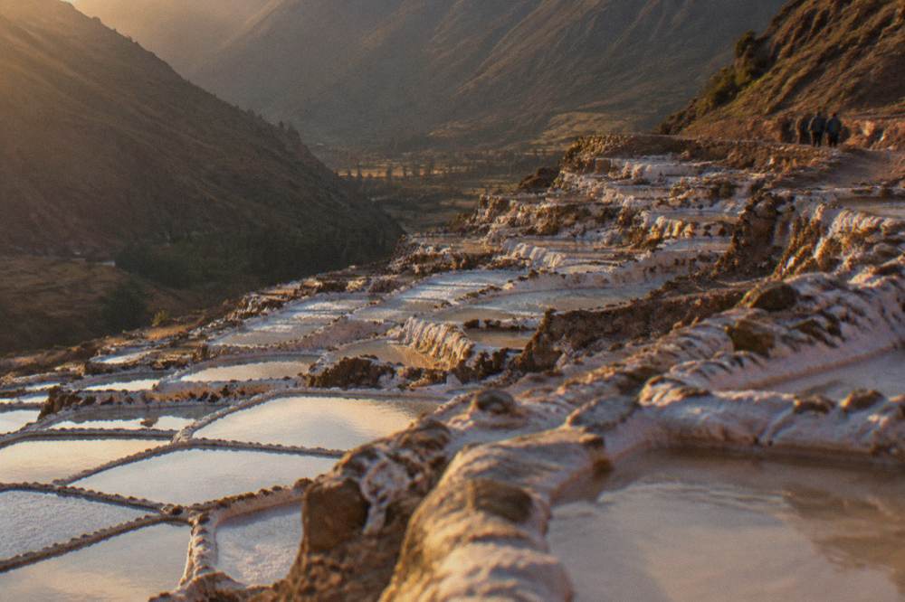 Terraced salt evaporation ponds on a hillside in the Sacred Valley near Maras