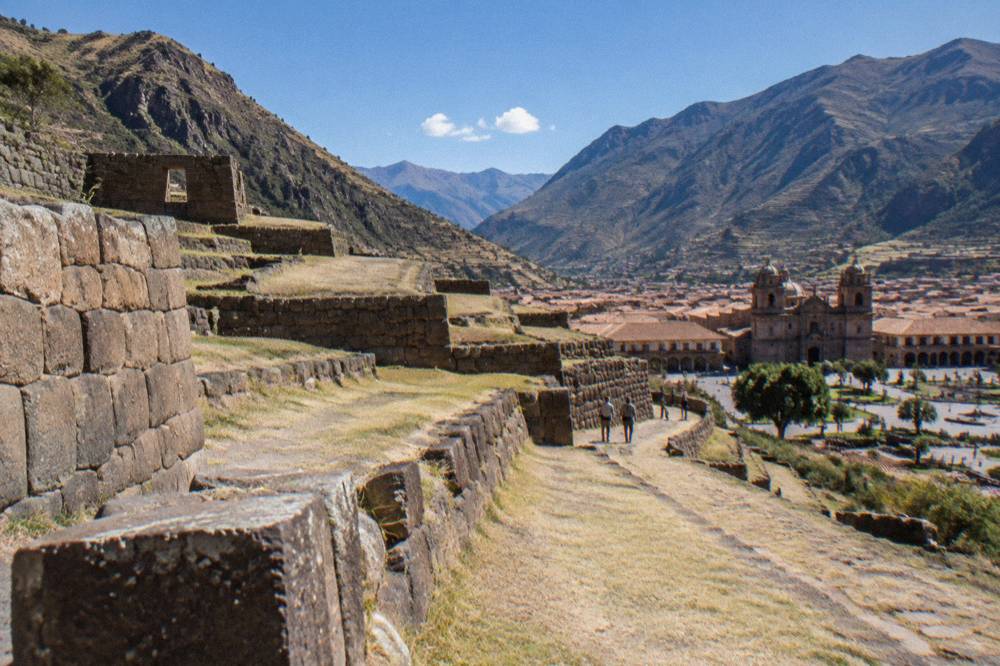 Colonial arcades and church towers around the Plaza de Armas in Cusco