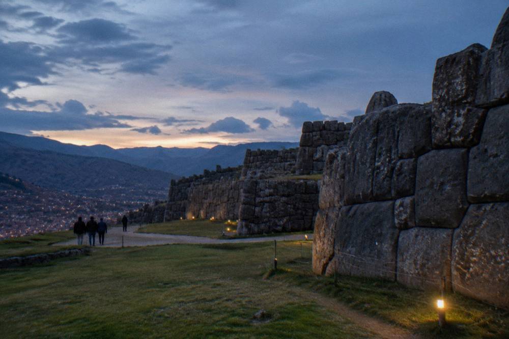 Massive fitted stone walls of Saqsayhuaman under a wide highland sky